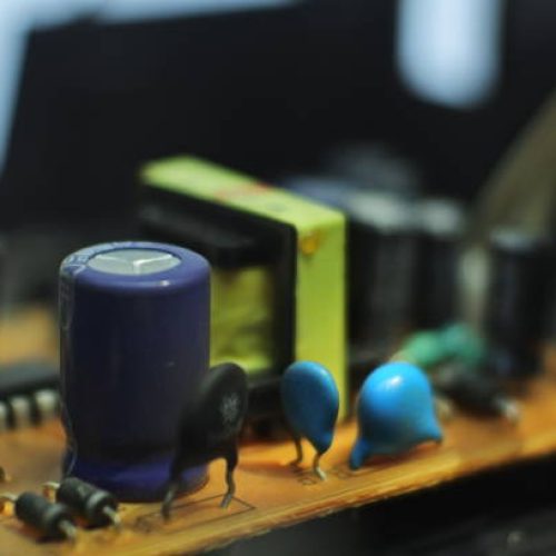 electronic transistor circuit. Electronic circuit board with processor, close up.